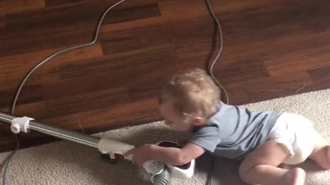 Baby loves to clean