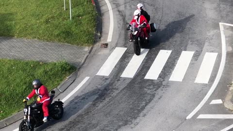 Santa riding a bike for Christmas in Viana do Castelo