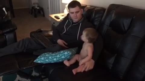 Baby dances with daddy