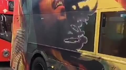 A london bus shows One love from bob marley