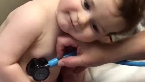 Adorable Baby Boy Cuddles on Nurse