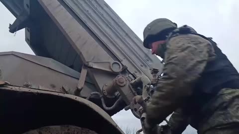 Crews of the BM-21 Grad MLRS working