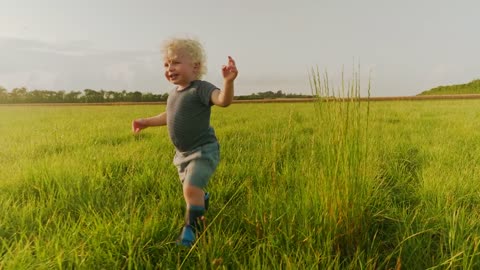 Young boy out in the countryside