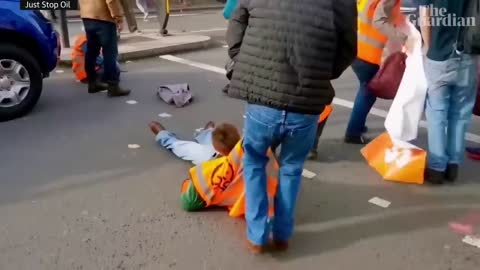 Motorists drag Just Stop Oil protesters off central London road