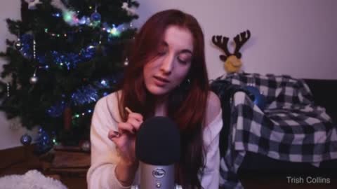 Asmr girl with a microphone relaxes her ears