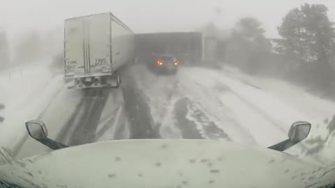 Dashcam footage of a truck ramming into car involved in pileup in Canada