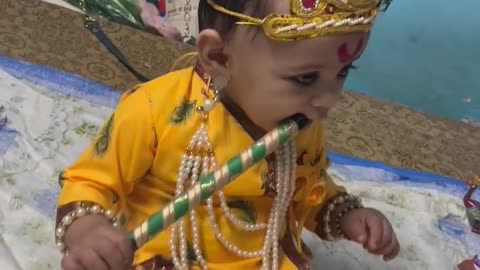 Little Lord Krishna playing