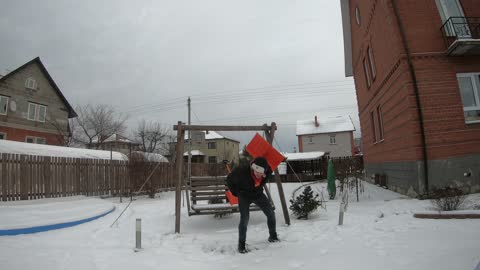 Russian guy dancing with a snow shovel. a litle bit funny