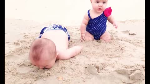 Funny Baby's Reaction On The Beach