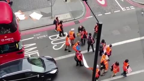 London UK: Globohomo globalist NGO funded 'Just Stop Oil' liberals are dealt with by lone man.