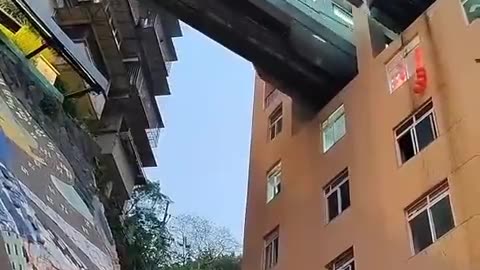 Chongqing, a subway passing through a residential building is no surprising...