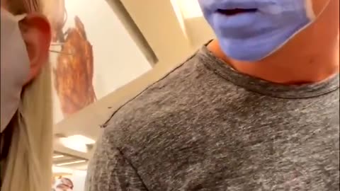 Guy Paints A Mask On His Face