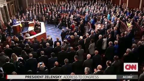 Zelensky unveils Ukraine battle flag during speech to Congress