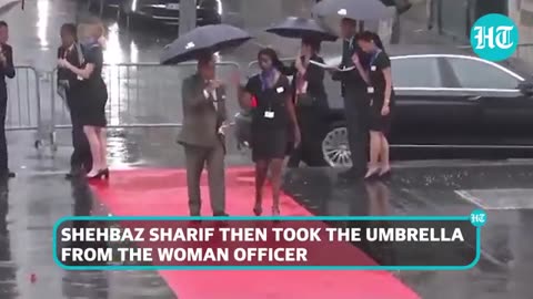 Pak PM 'Pulls' Umbrella From Woman Officer in France; She Is Drenched In Rain | Watch