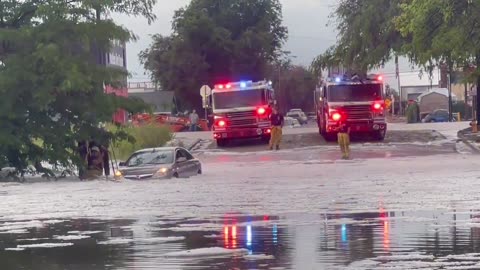 Colorado firefighters rescue motorist trapped in floodwater