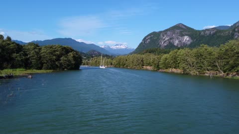 Blue lake with snowy mountains