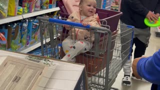 Baby Bursts Out Laughing at Game of Frisbee