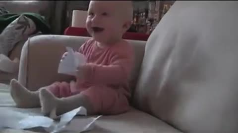 Baby laughs