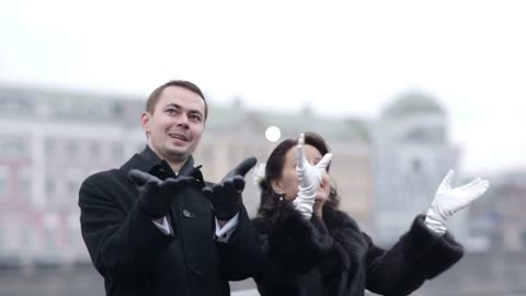 Bride and groom releasing pigeons. Wedding traditions and rituals. Winter