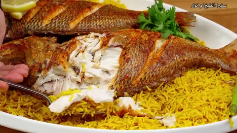 Grilled fish with a special seasoning 🐠 with yellow fish rice and sauce