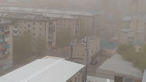 Raging Wind Rips Roof From Building