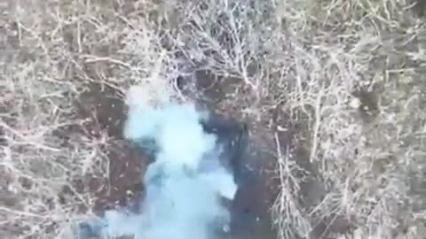 Ukrainian drone drop granade on the head of a Russian soldier, head flies off.