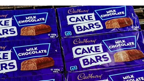 Indulge in the ultimate sweet treat with Cadbury's luxurious Milk Chocolate Cake Bars!