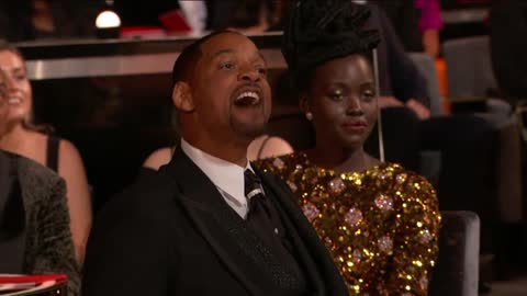 Will Smith smacks Chris Rock on stage at the Oscars