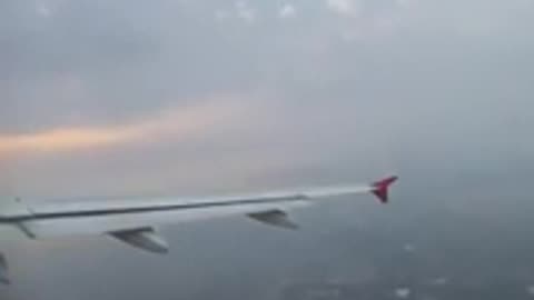 An Airplane Taking Off From The Runway