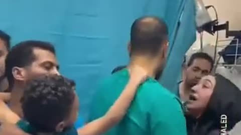 A Palestinian doctor is saddened after realizing that his son was killed