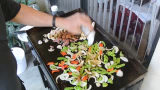 Cooking on a Blackstone griddle, Ground beef fajitas.