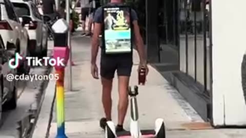 A Walking Billboard and a stalking Segway.