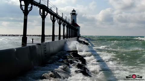 Massive Slow-Motion Waves Slam Into Michigan City Lighthouse 4K Drone Footage