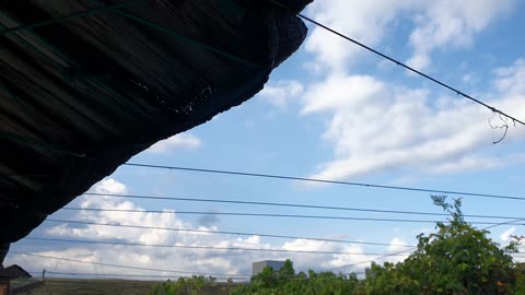 the sky from under the eaves