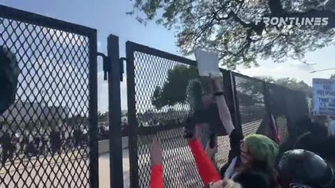 A FENCE HAS BEEN TORN DOWN BY LEFTISTS OUTSIDE THE DNC