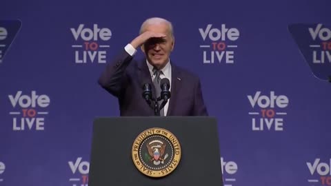 Biden gets cut off by the music, then wanders around...