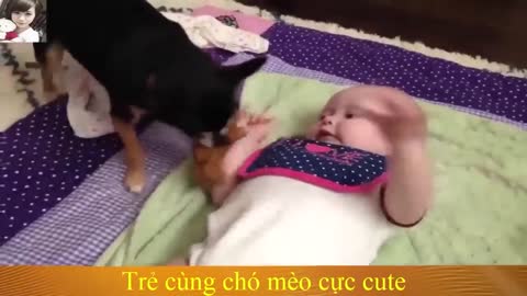 Very very Cute Baby playing with dog....