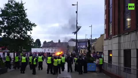 Enraged protesters set police car ablaze in Sunderland, UK