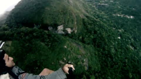 Paragliders Pray Their Way Out of the Clouds