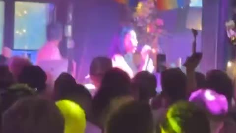 Katie Price puts on busty display as she sings at Manchester Pride