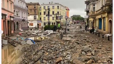 Kłodzko, Poland. Street view image before yesterday’s flood and a photo taken