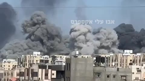 Fighter jets attack the towers in Hamad neighborhood in Khan Yunis after the evacuation warning