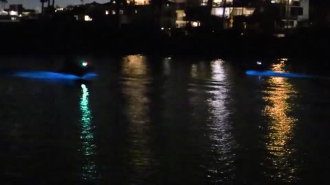 Jet Ski Trails Lit by Bioluminescent Algae