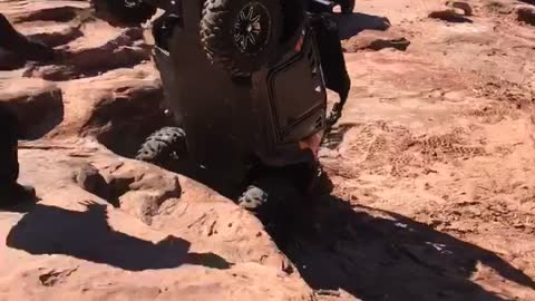 RZR goes over backwards on Moab Trail