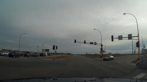 Chrysler 300 Gets Air While Speeding Through Intersection!