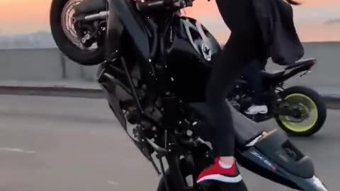 Biker girl stunt