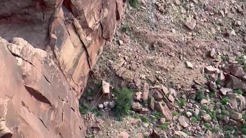 Rope Swing Through The Canyon