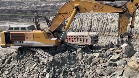 Liebherr 974 Excavator Loading Mercedes And MAN Trucks