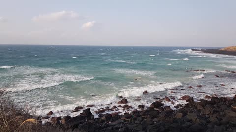 Watching the waves on Jeju Island in Korea