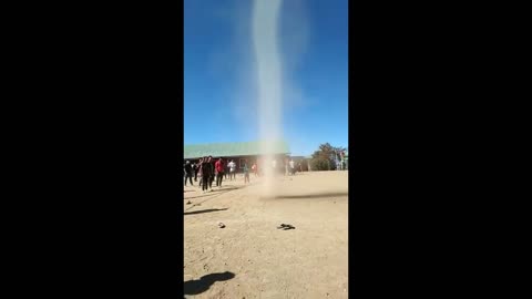 Tall Dust Devil Entertains Crowd